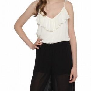 New sleeveless black white jumpsuit